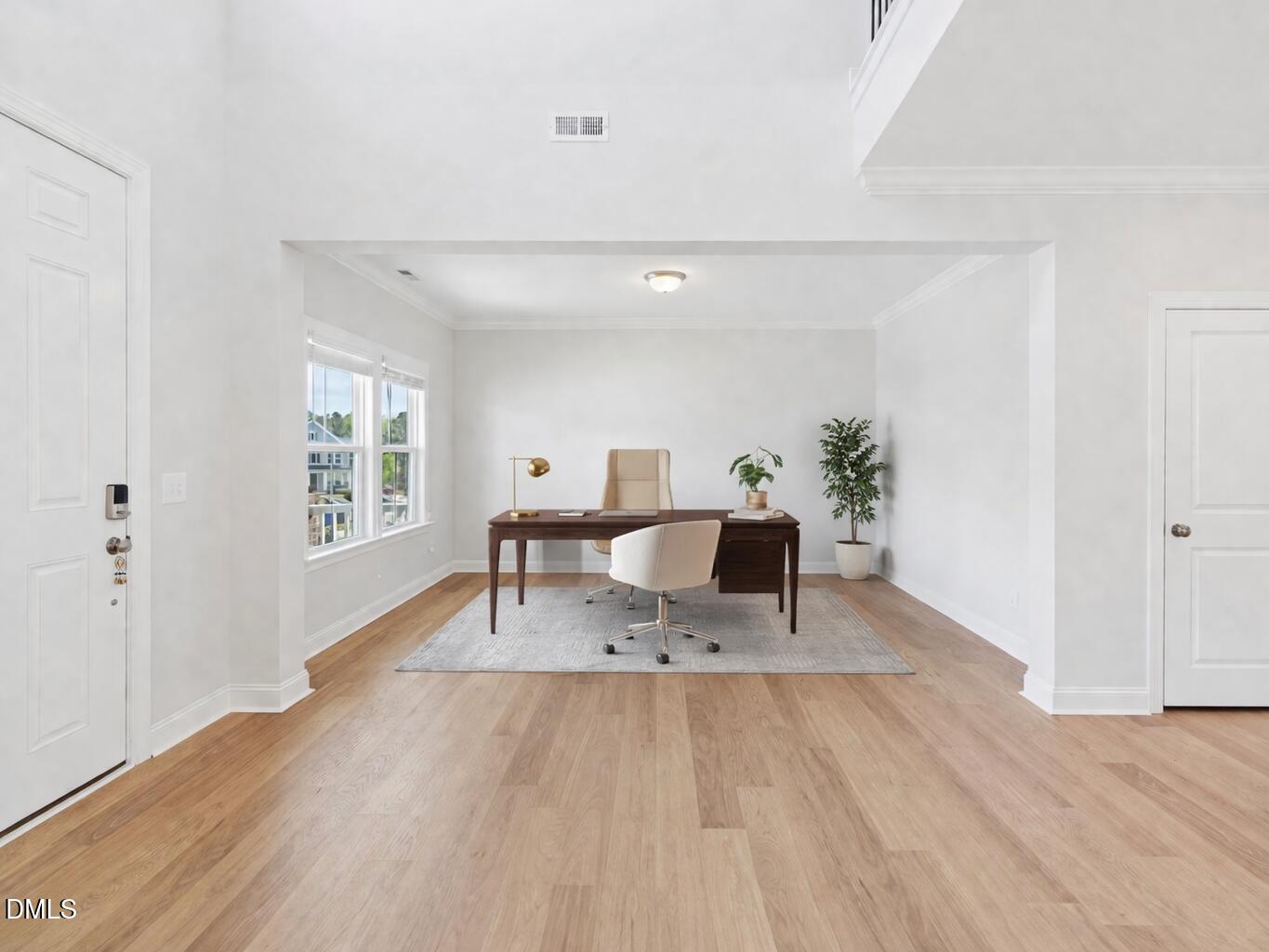 2616 Nordmann Fir Road Raleigh, NC 27616 - Photo 6 of 53 a living room with furniture and wooden floor