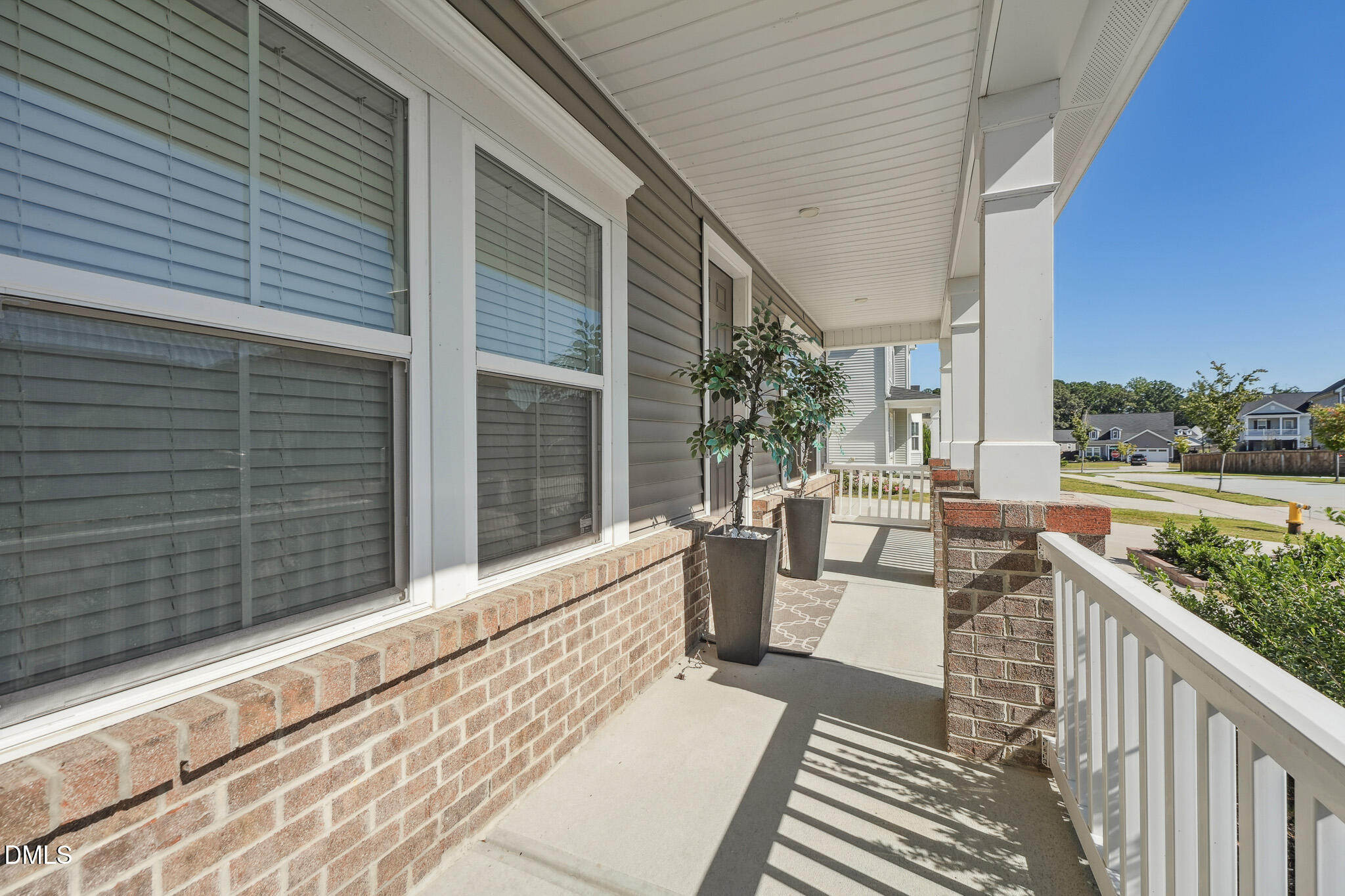 2616 Nordmann Fir Road Raleigh, NC 27616 - Photo 7 of 53 a view of a balcony with wooden floor