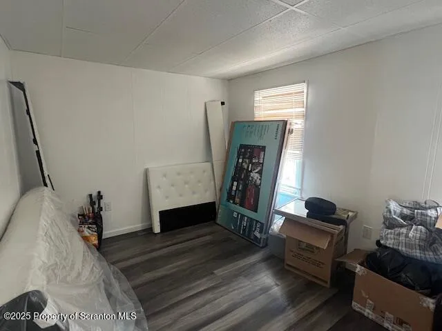 a view of a yard with a tree