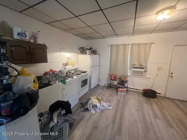 a room with wooden cabinets and a sink
