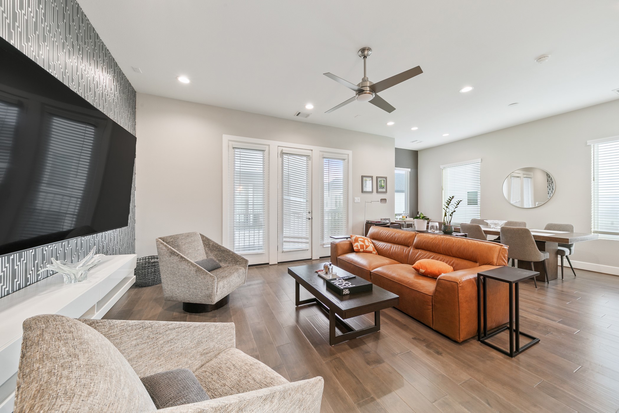 4032 Buck Street, Unit A Houston, TX 77020 - Photo 14 of 39 a living room with furniture and a flat screen tv