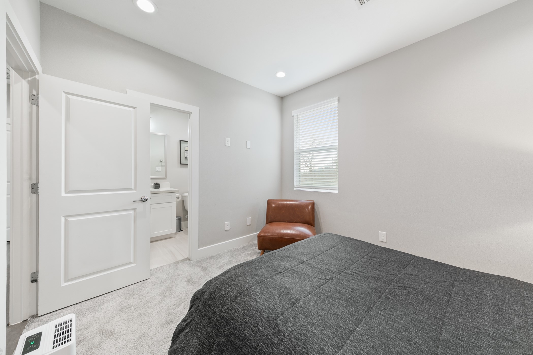 4032 Buck Street, Unit A Houston, TX 77020 - Photo 31 of 39 a bedroom with a bed and a window