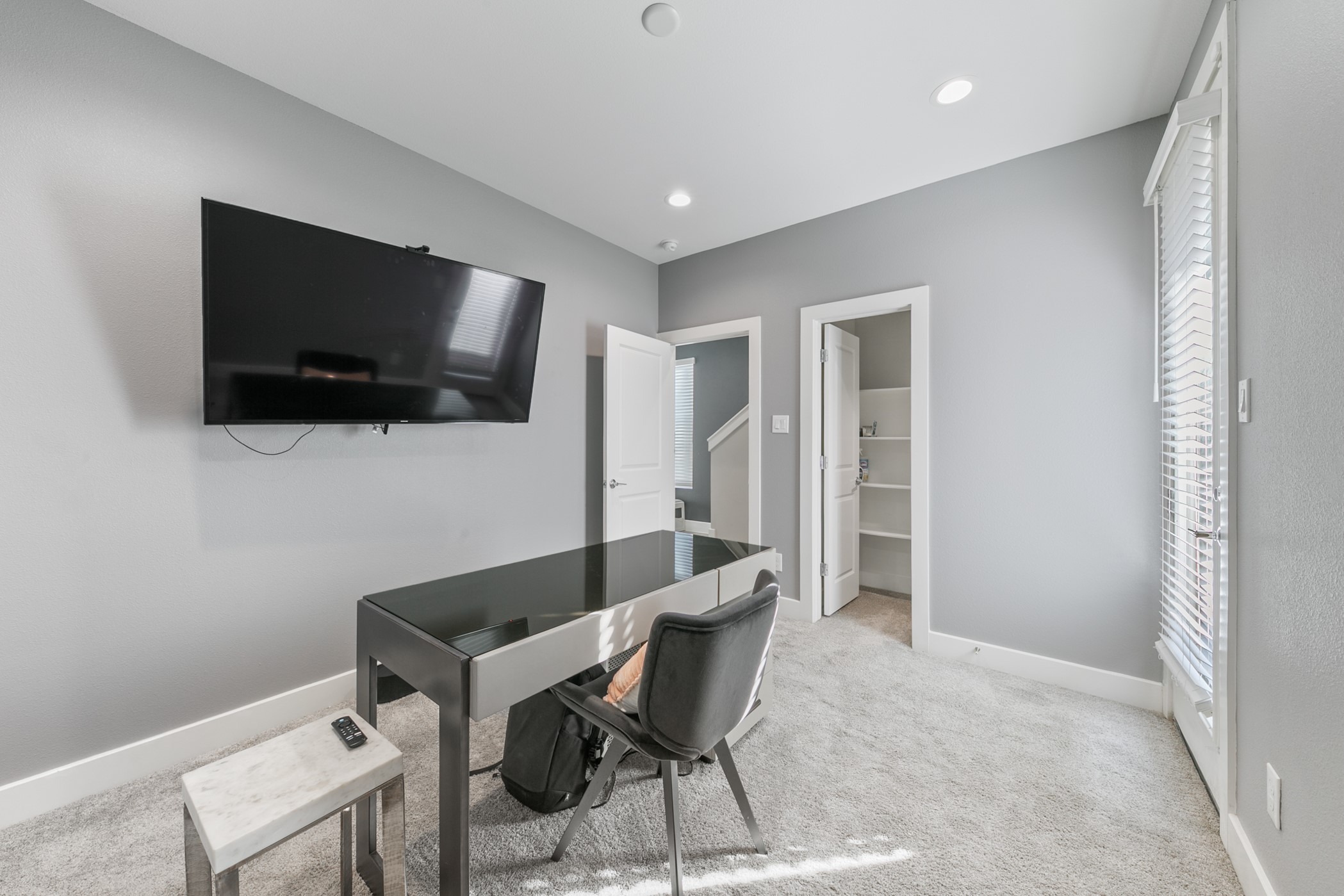 4032 Buck Street, Unit A Houston, TX 77020 - Photo 6 of 39 a living room with furniture and a flat screen tv