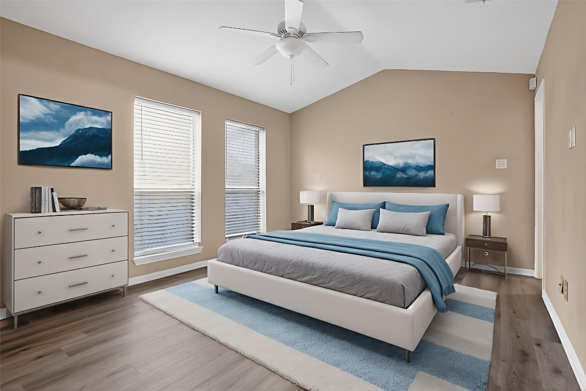 8299 Cambridge Street, Unit 706 Houston, TX 77054 - Photo 14 of 30 a spacious bedroom with a bed and a window