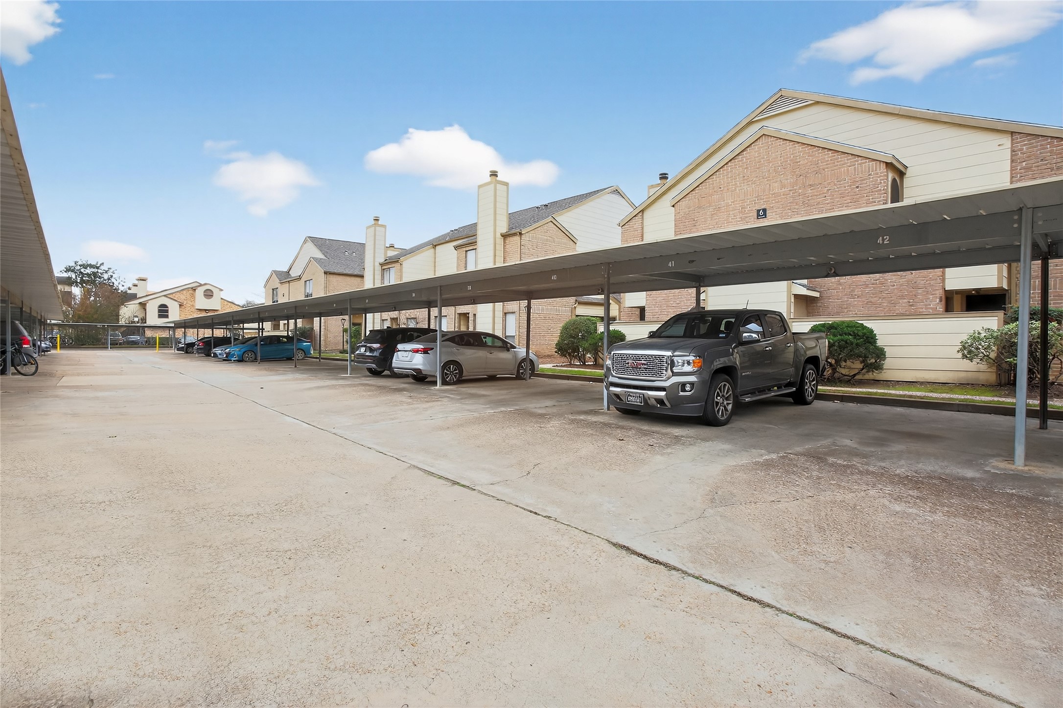 8299 Cambridge Street, Unit 706 Houston, TX 77054 - Photo 28 of 30 a view of parking with cars parked
