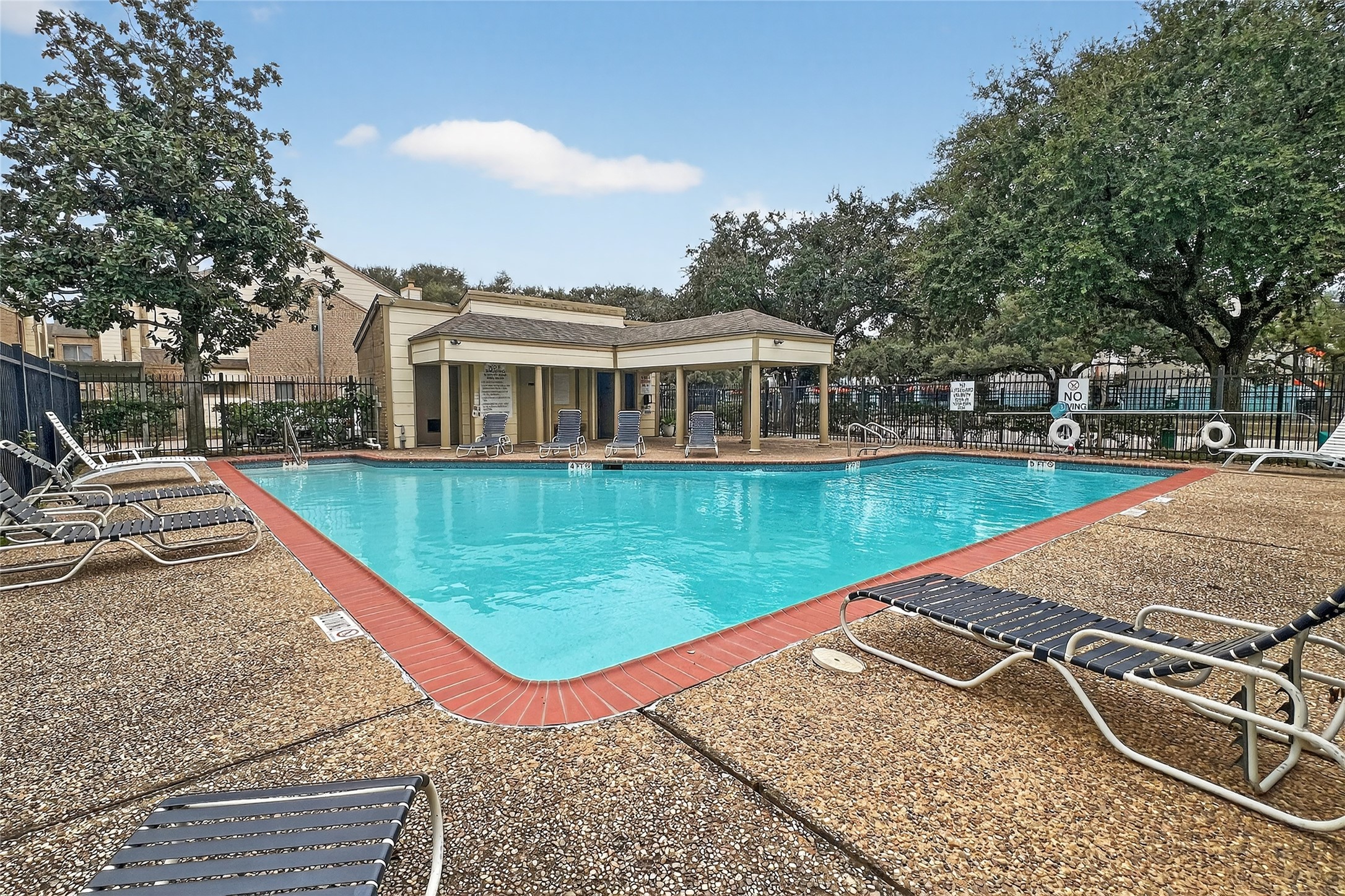 8299 Cambridge Street, Unit 706 Houston, TX 77054 - Photo 29 of 30 an outdoor space with swimming pool and furniture