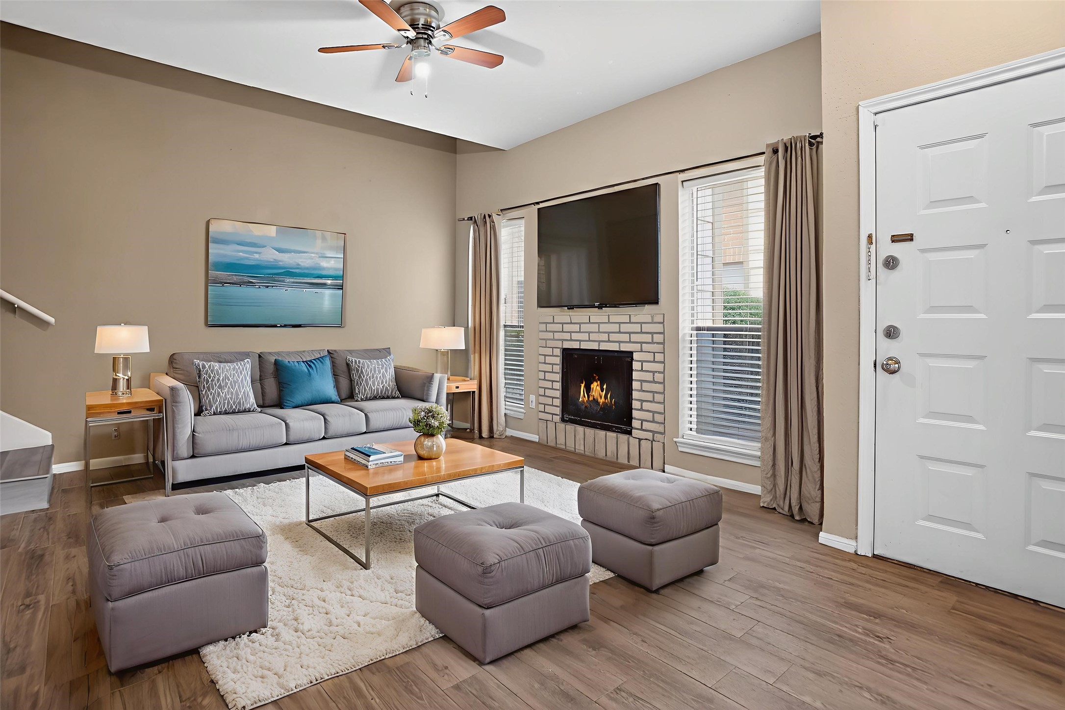 8299 Cambridge Street, Unit 706 Houston, TX 77054 - Photo 3 of 30 a living room with furniture and a fireplace