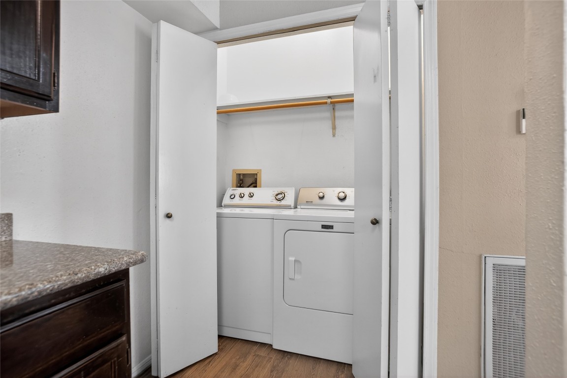 8299 Cambridge Street, Unit 706 Houston, TX 77054 - Photo 8 of 30 a utility room with dryer and washer
