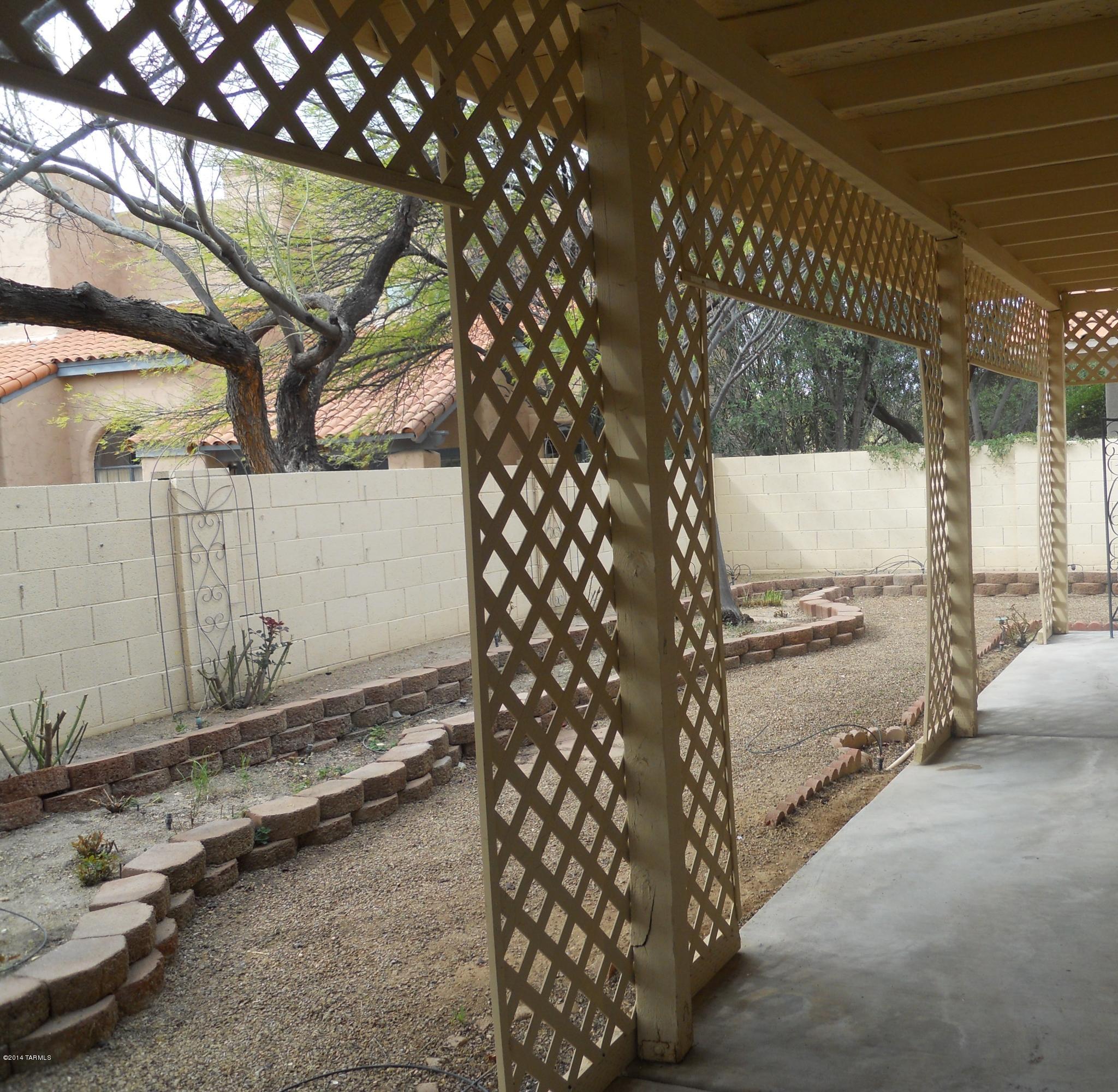 7736 East Elk Creek Road Tucson, AZ 85750 - Photo 9 of 11 a house view with a backyard space