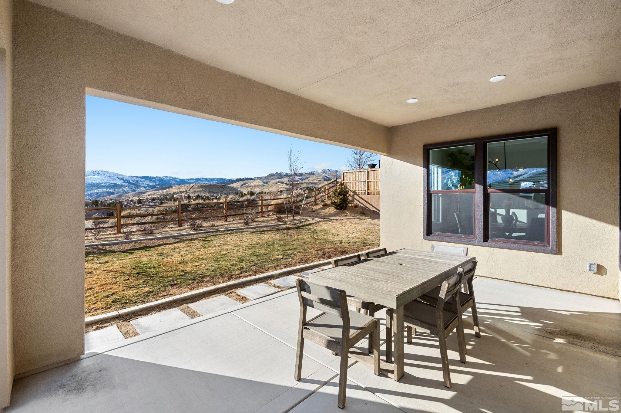 1621 Huntley Trail Reno, NV 89523 - Photo 31 of 40 a view of a dining room with furniture window and wooden floor