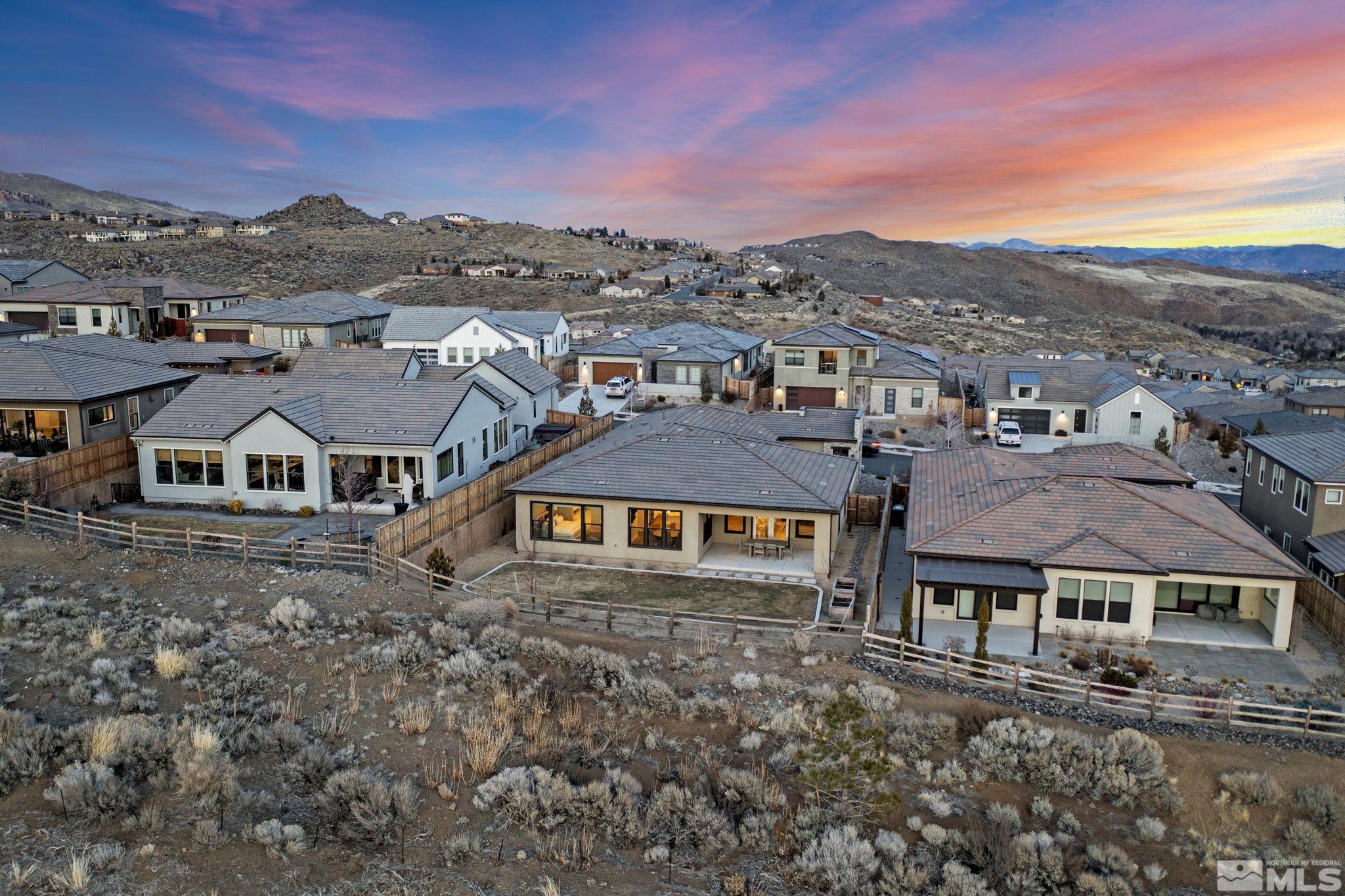 1621 Huntley Trail Reno, NV 89523 - Photo 34 of 40 an aerial view of residential houses with a city view