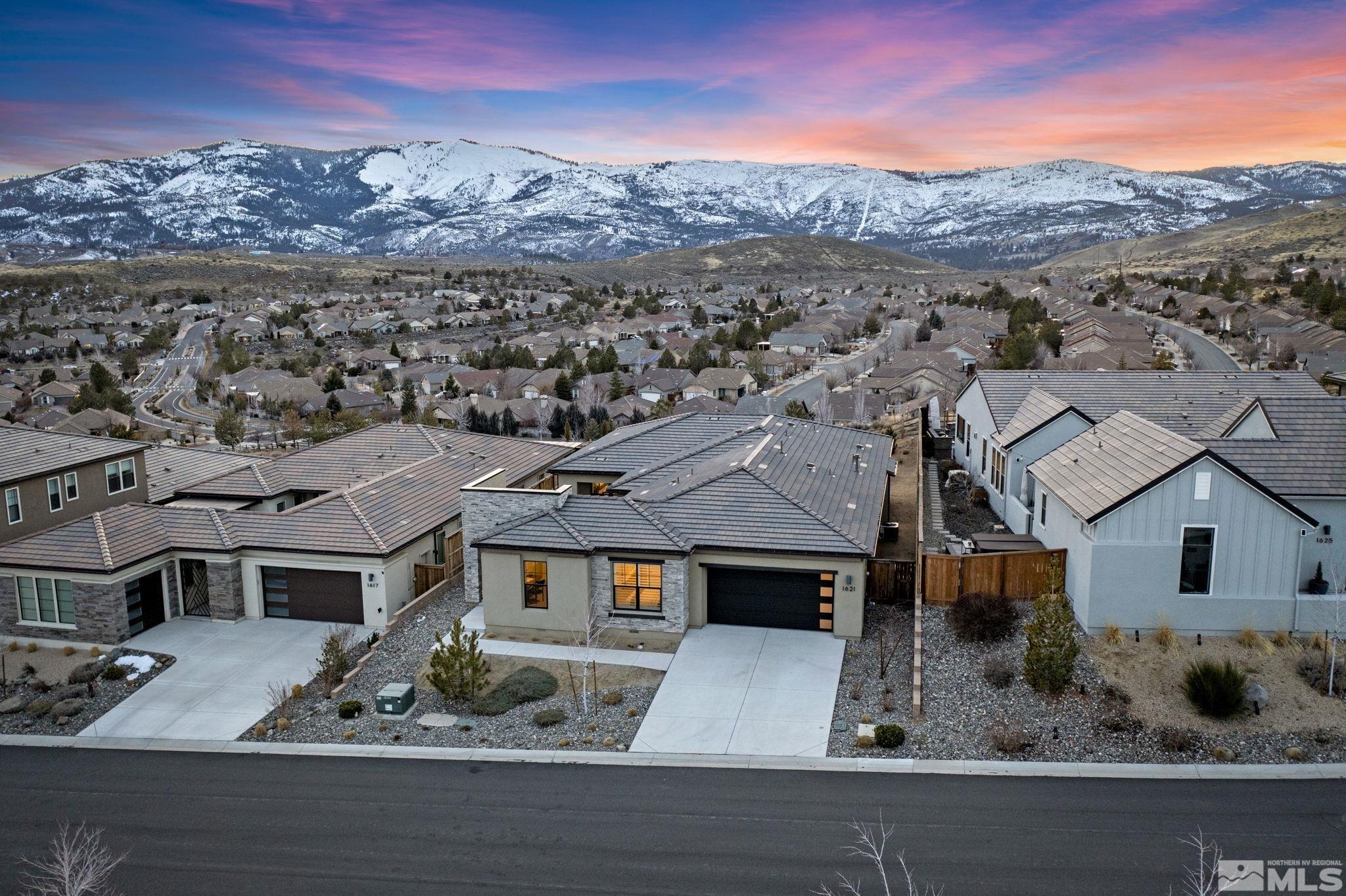 1621 Huntley Trail Reno, NV 89523 - Photo 36 of 40 an aerial view of residential houses with a city view