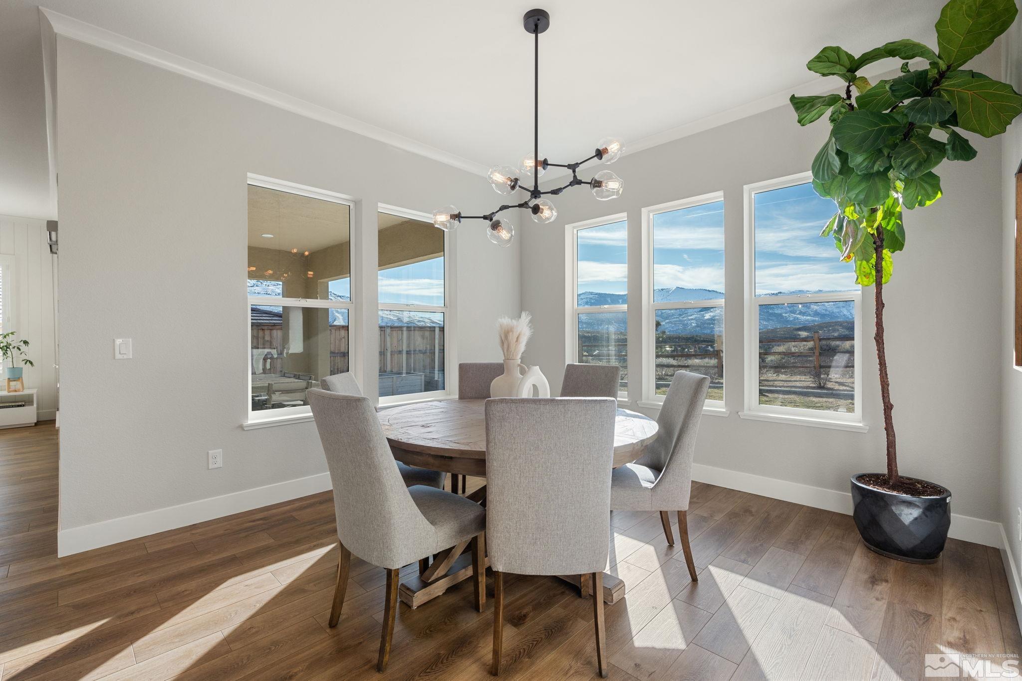 1621 Huntley Trail Reno, NV 89523 - Photo 10 of 40 a view of a dining room with furniture window and wooden floor