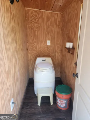 a view of a swimming pool with an outdoor space and seating area
