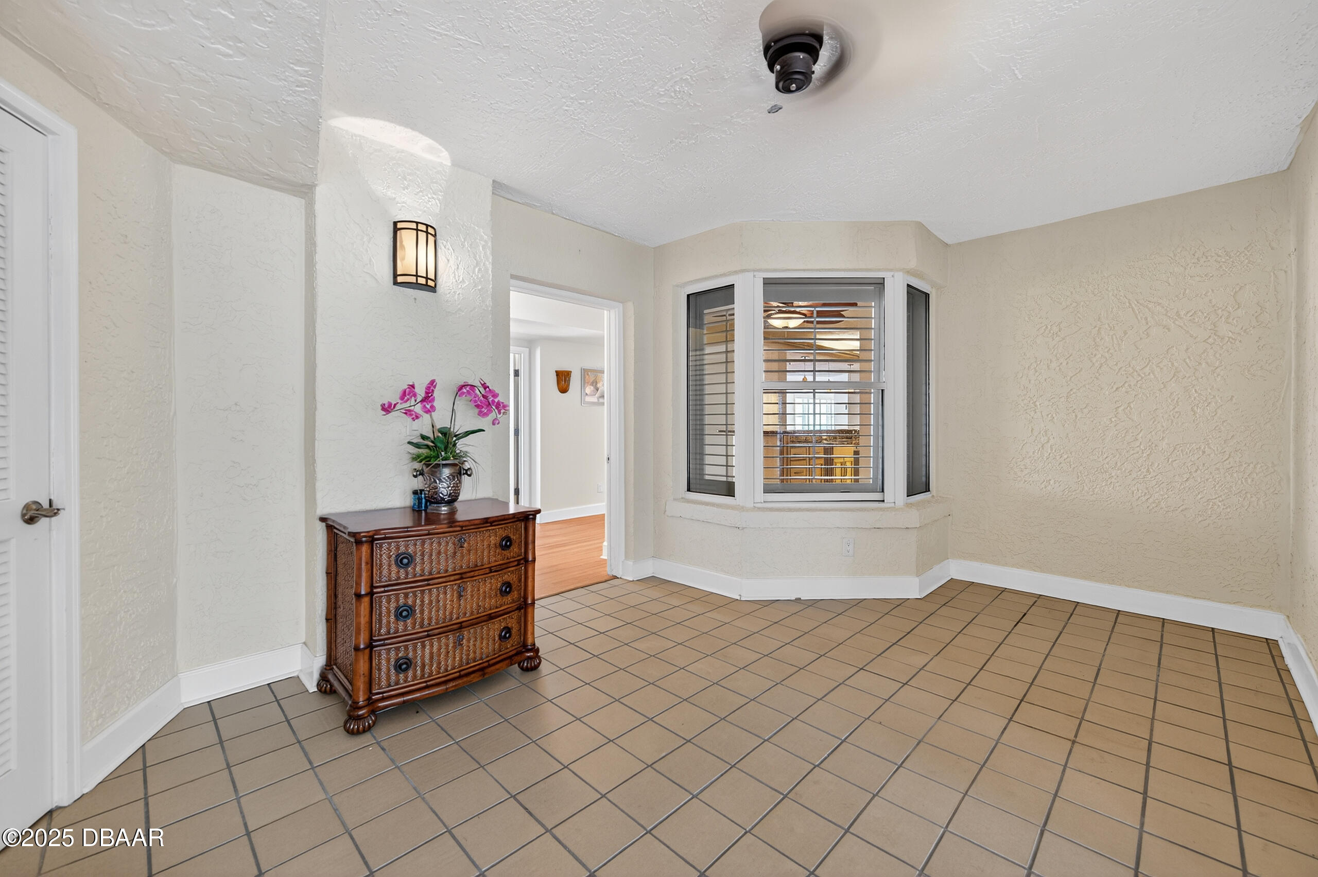 4555 South Atlantic Avenue, Unit 4603 Ponce Inlet, FL 32127 - Photo 20 of 39 a view of livingroom with furniture and window