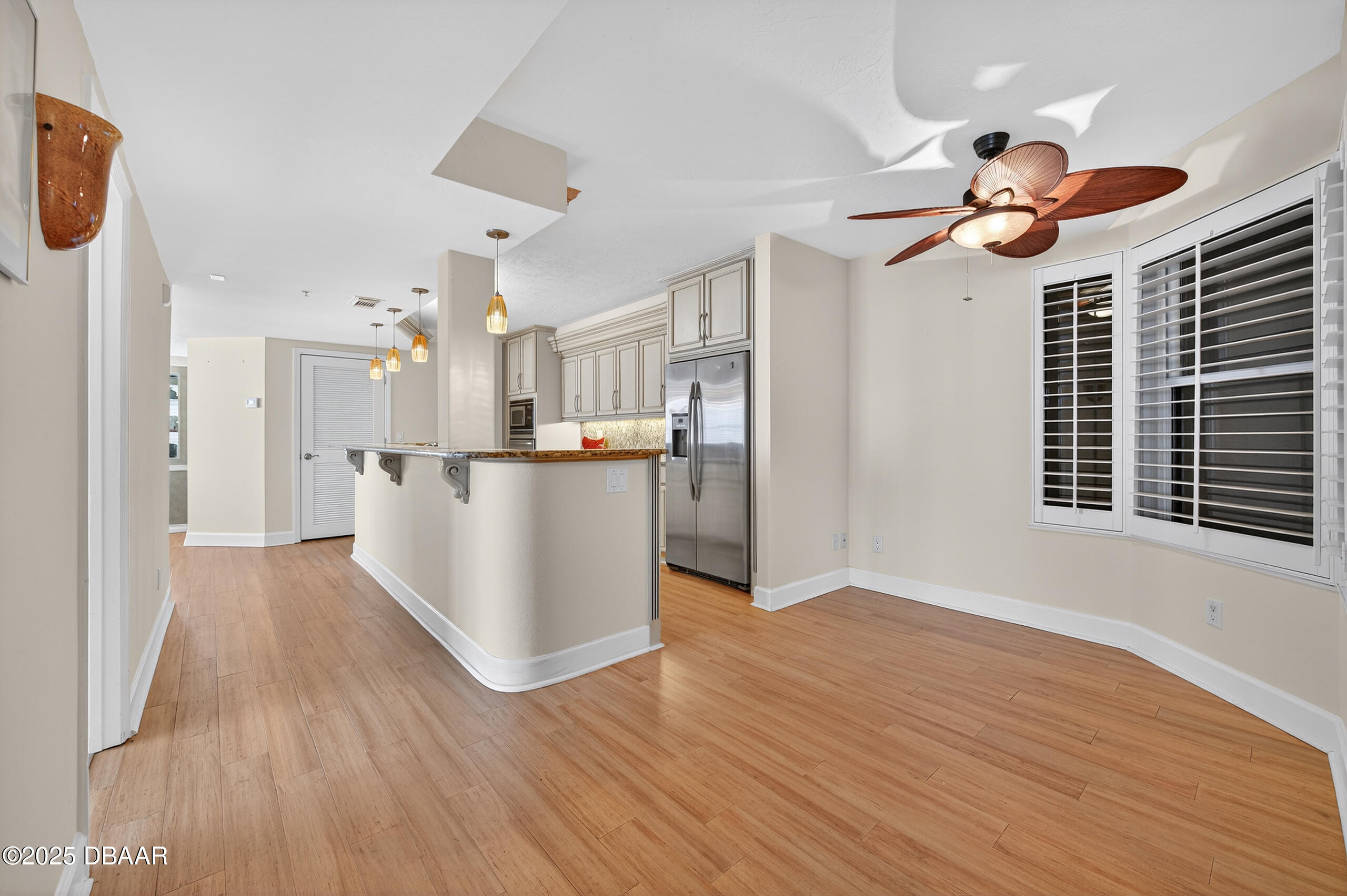 4555 South Atlantic Avenue, Unit 4603 Ponce Inlet, FL 32127 - Photo 21 of 39 a view of a kitchen with wooden floor