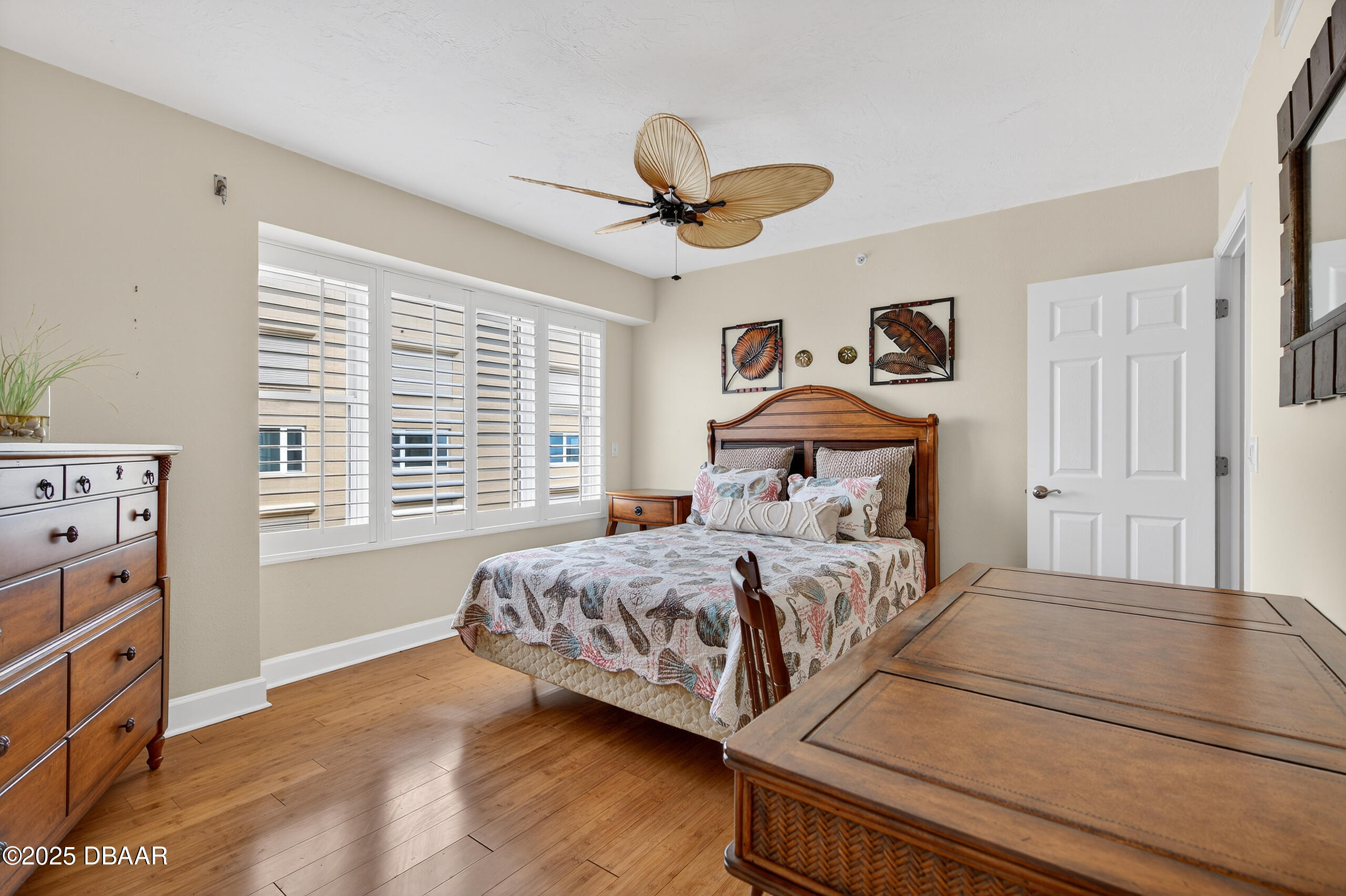 4555 South Atlantic Avenue, Unit 4603 Ponce Inlet, FL 32127 - Photo 38 of 39 a bedroom with a bed and a window