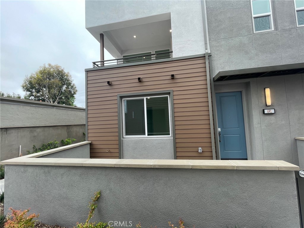 691 South Lyon Street Santa Ana, CA 92705 - Photo 4 of 17 a front view of a house with stairs