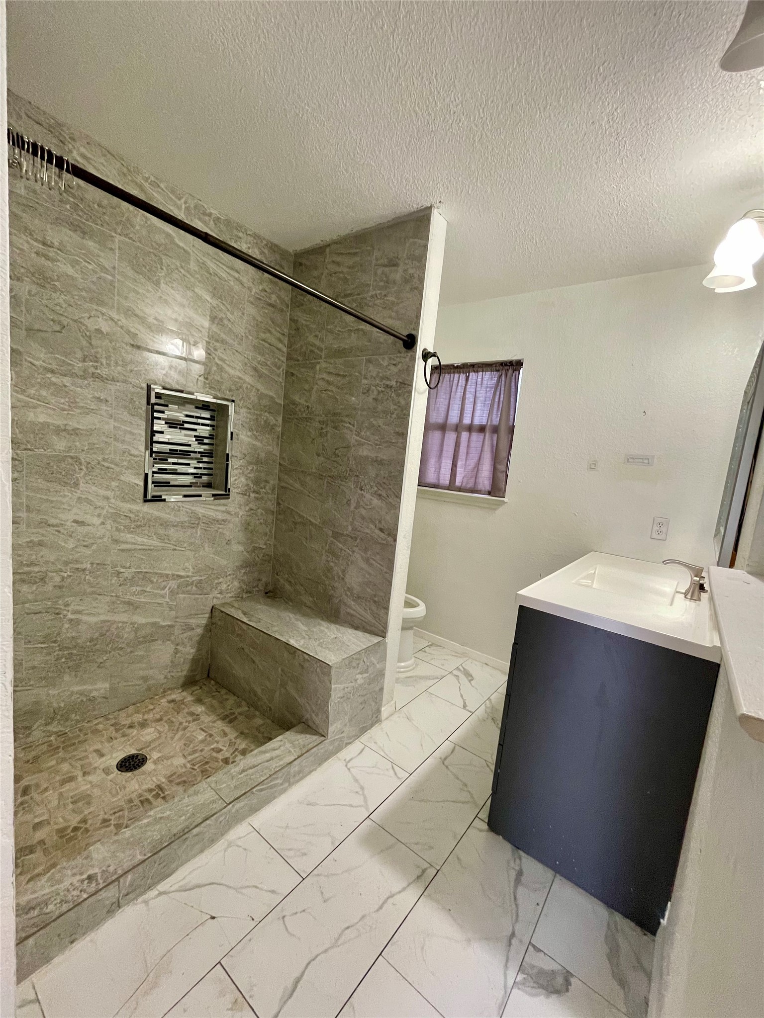 893 County Road 3376 Kempner, TX 76539 - Photo 16 of 23 a bathroom with a bathtub and shower