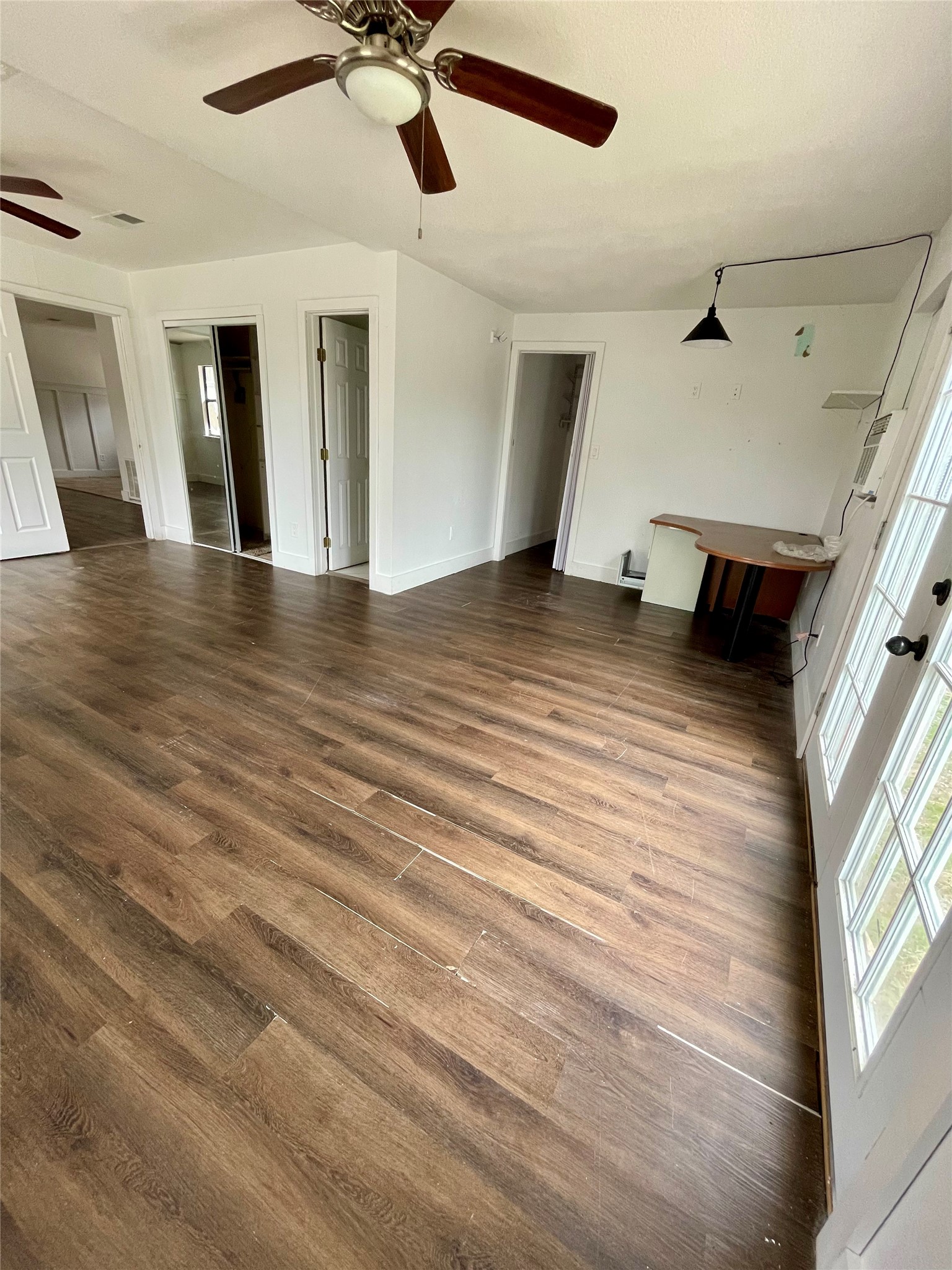 893 County Road 3376 Kempner, TX 76539 - Photo 5 of 23 a view of a livingroom with a ceiling fan and wooden floor