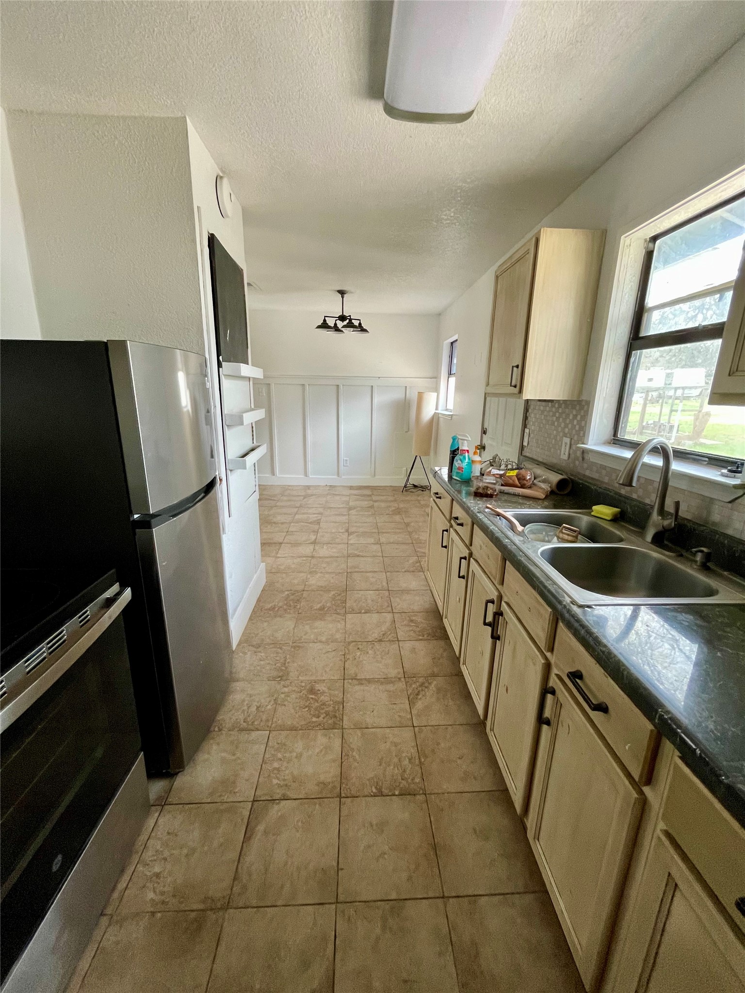 893 County Road 3376 Kempner, TX 76539 - Photo 8 of 23 a kitchen with stainless steel appliances a sink stove and refrigerator