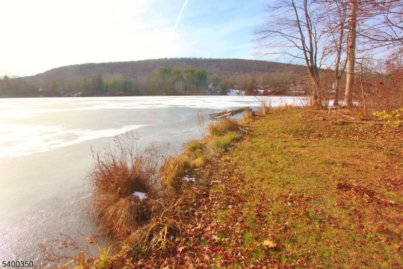 22 Choctaw Oak Ridge Oak Ridge, NJ 07438 - Photo 21 of 23 a view of lake with mountain
