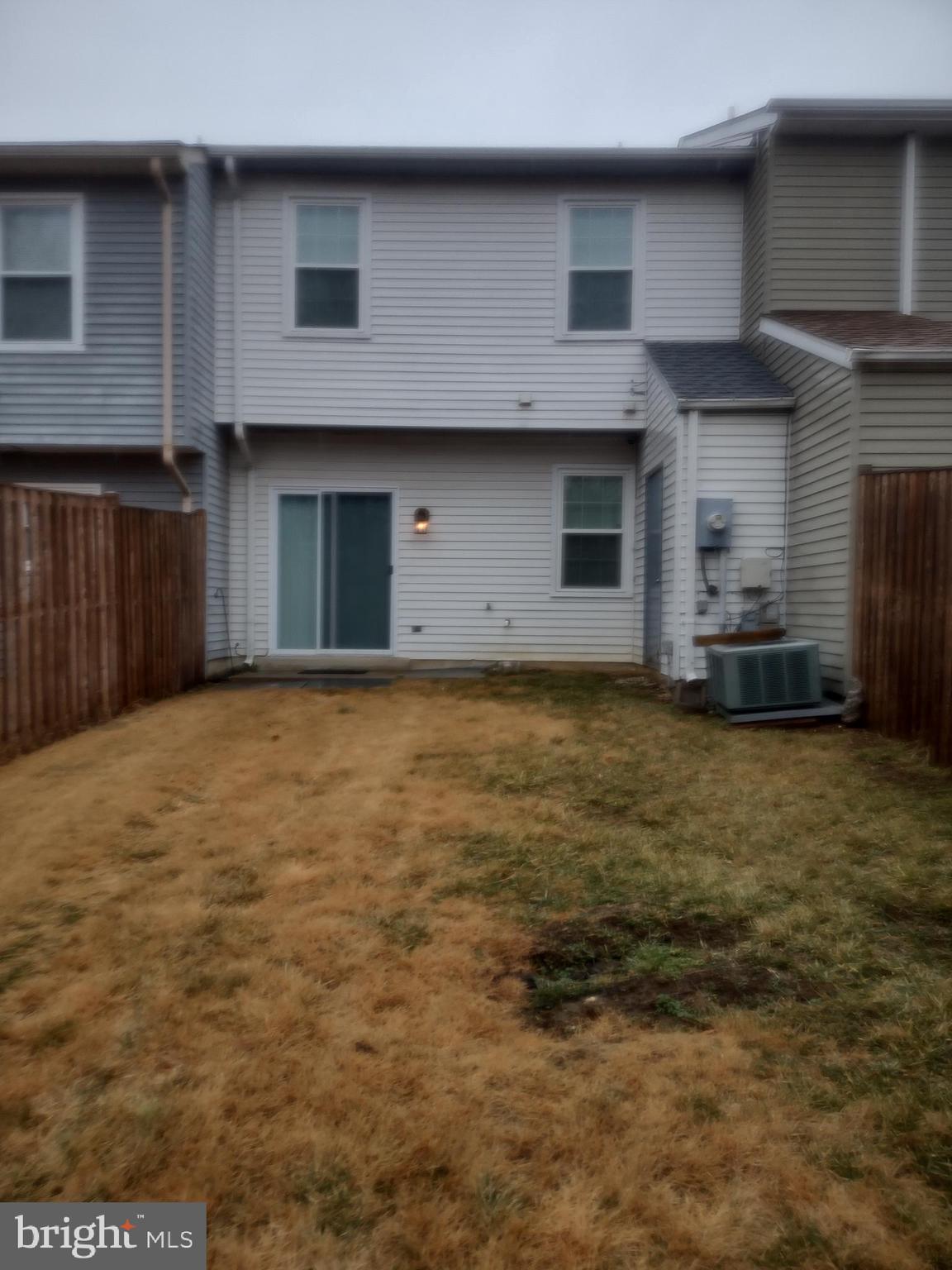 11235 Kettering Place Upper Marlboro, MD 20774 - Photo 3 of 22 a view of a house with a yard