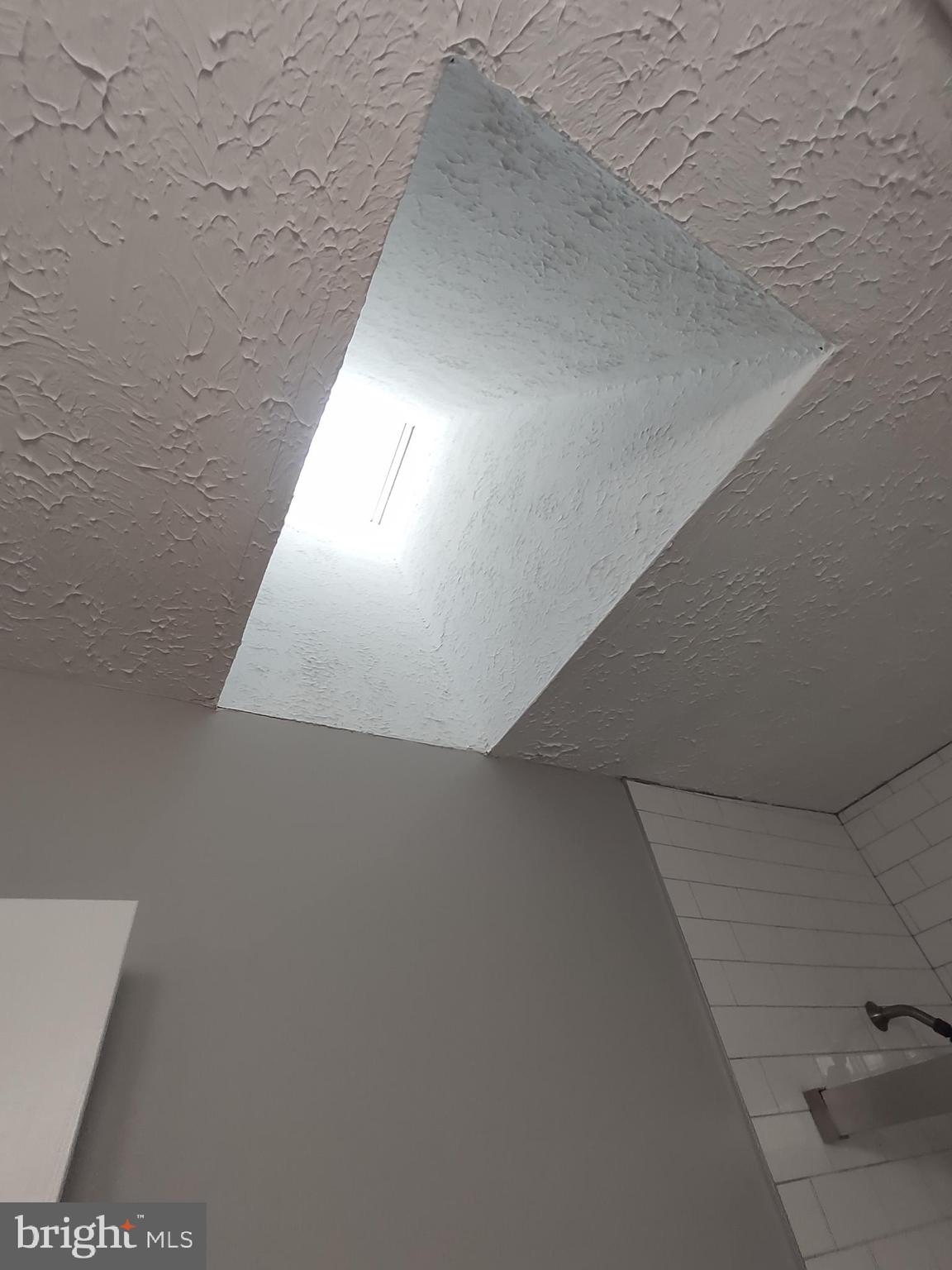 11235 Kettering Place Upper Marlboro, MD 20774 - Photo 10 of 22 a view of an empty room and window