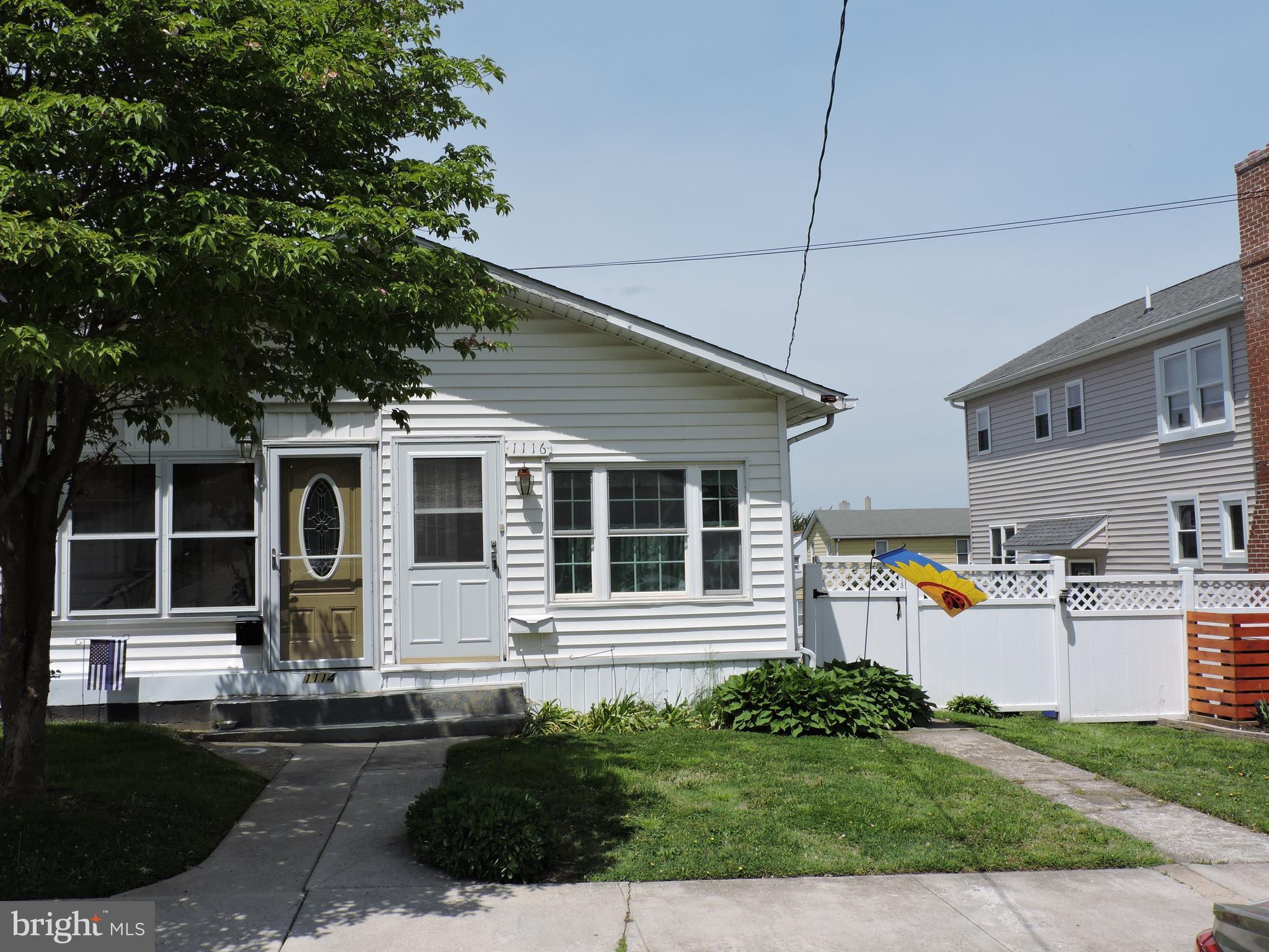 1116 Maple Street Conshohocken, PA 19428 - Photo 2 of 42 a front view of a house with garage