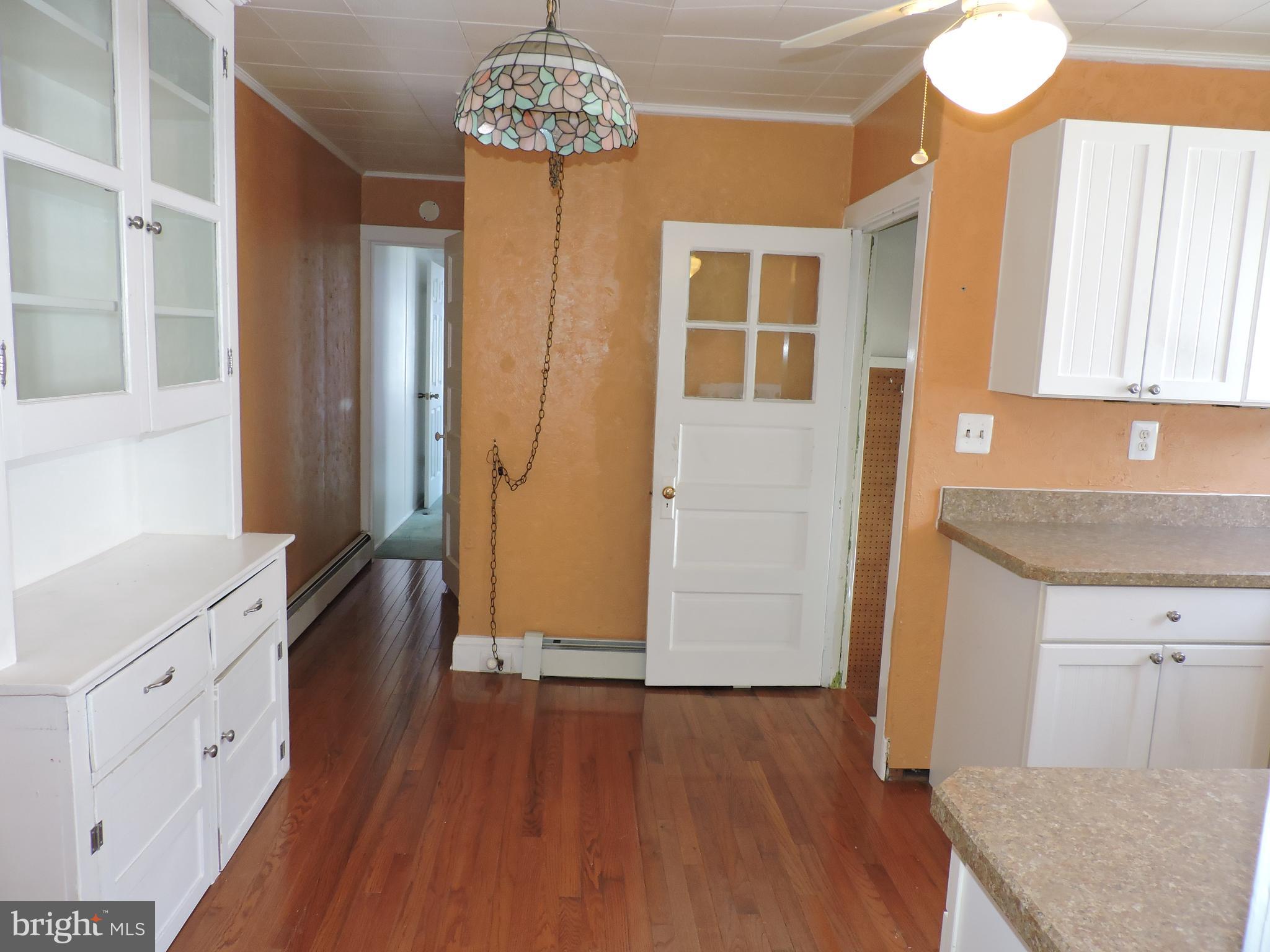 1116 Maple Street Conshohocken, PA 19428 - Photo 13 of 42 a view of a kitchen from a hallway