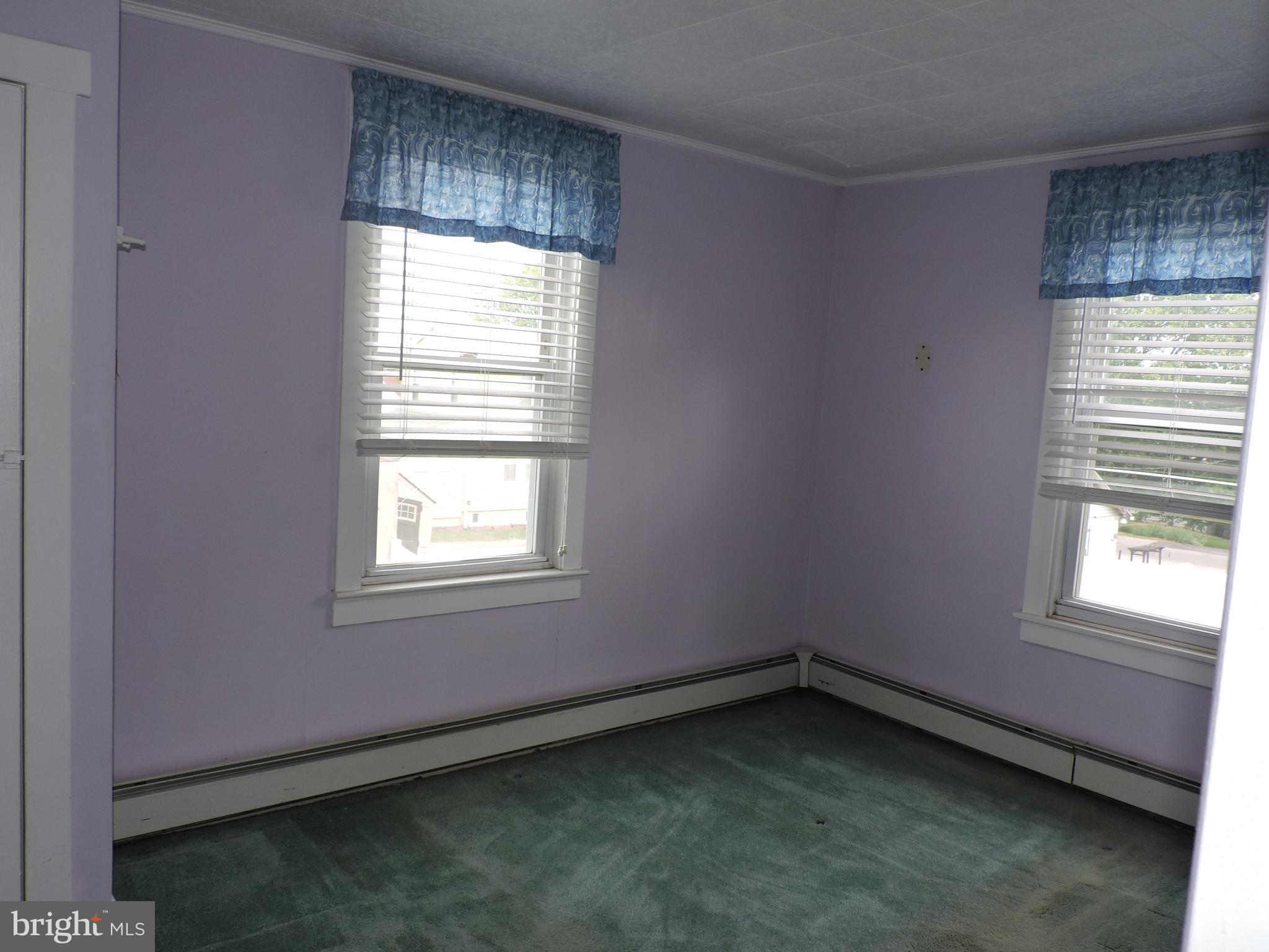 1116 Maple Street Conshohocken, PA 19428 - Photo 18 of 42 an empty room with a window
