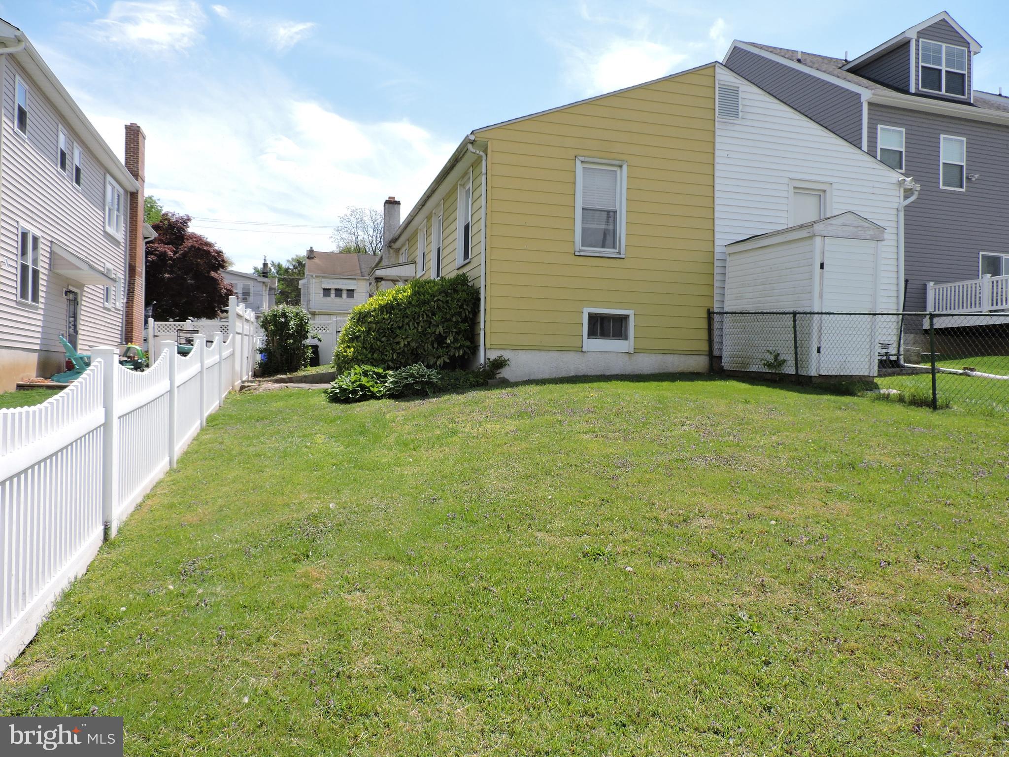 1116 Maple Street Conshohocken, PA 19428 - Photo 3 of 42 a view of a house with backyard and garden