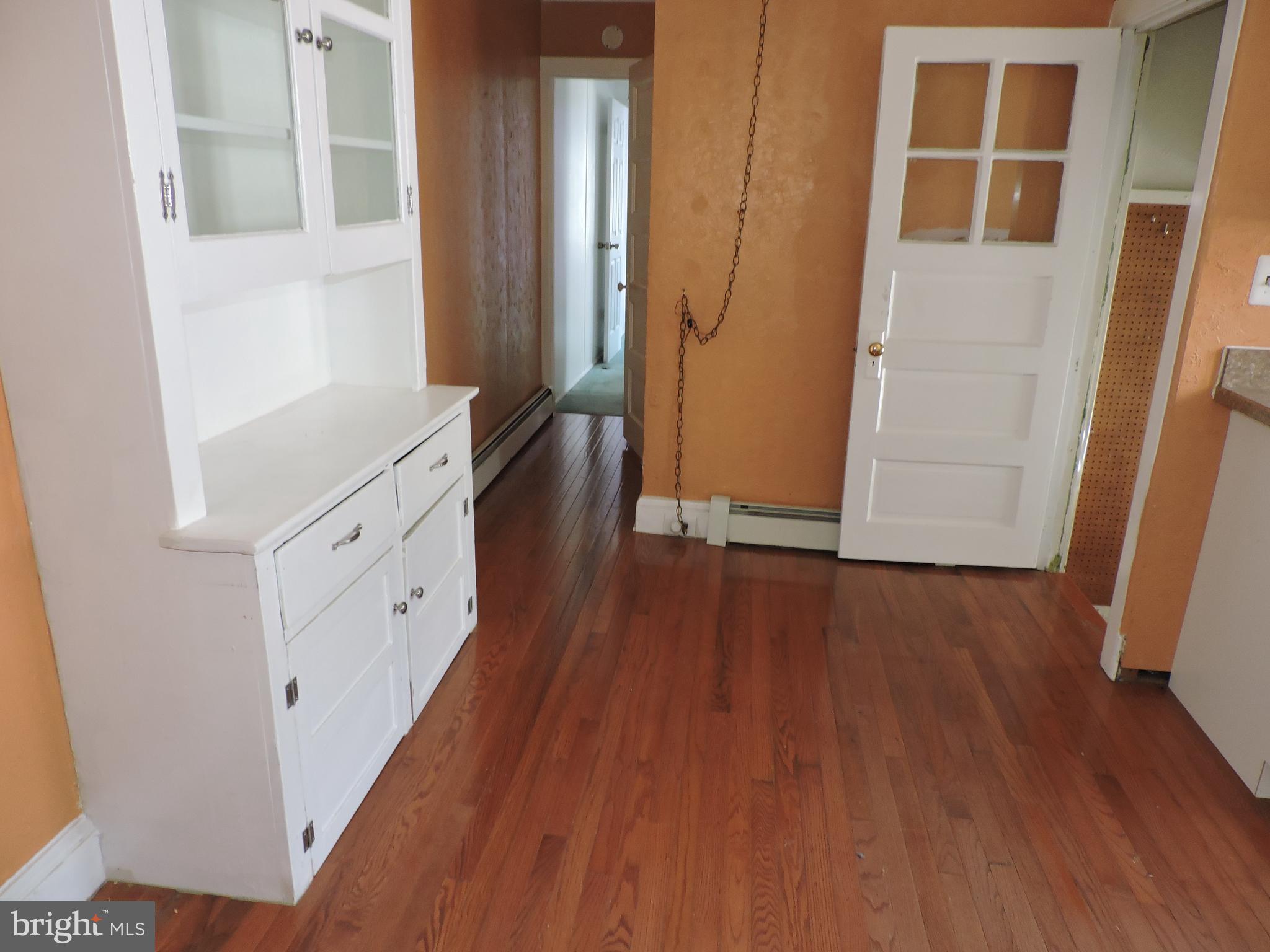 1116 Maple Street Conshohocken, PA 19428 - Photo 22 of 42 a view of walk in closet with wooden floor