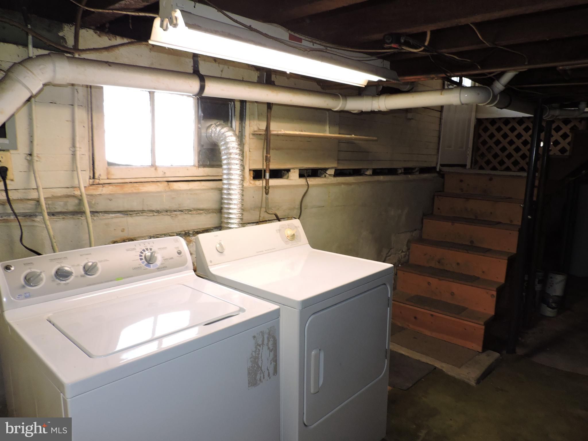 1116 Maple Street Conshohocken, PA 19428 - Photo 29 of 42 a utility room with dryer and washer