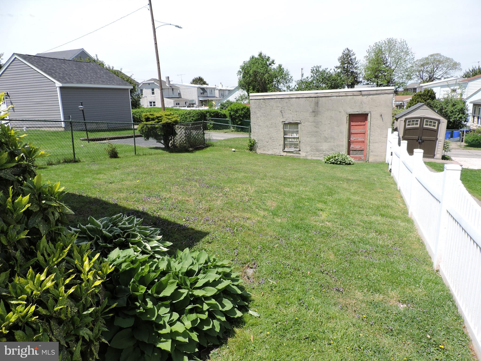 1116 Maple Street Conshohocken, PA 19428 - Photo 6 of 42 a view of a house with backyard and sitting area