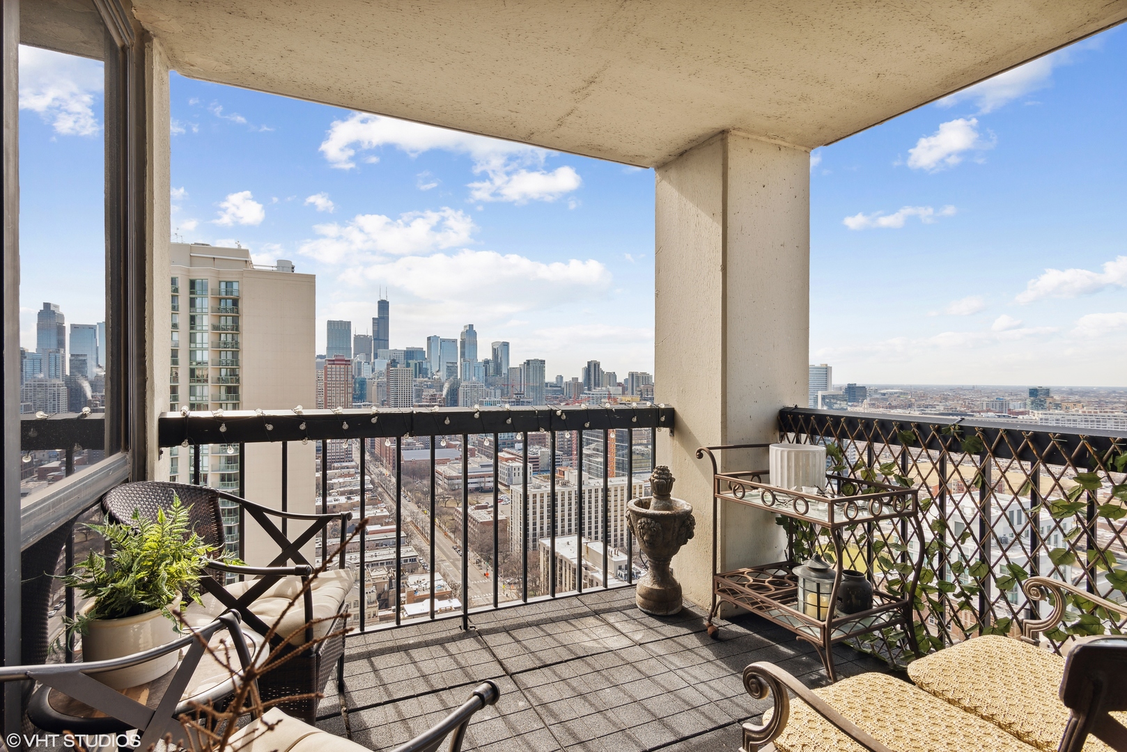 1122 North Clark Street, Unit 3401 Chicago, IL 60610 - Photo 18 of 26 a view of a balcony with wooden floor