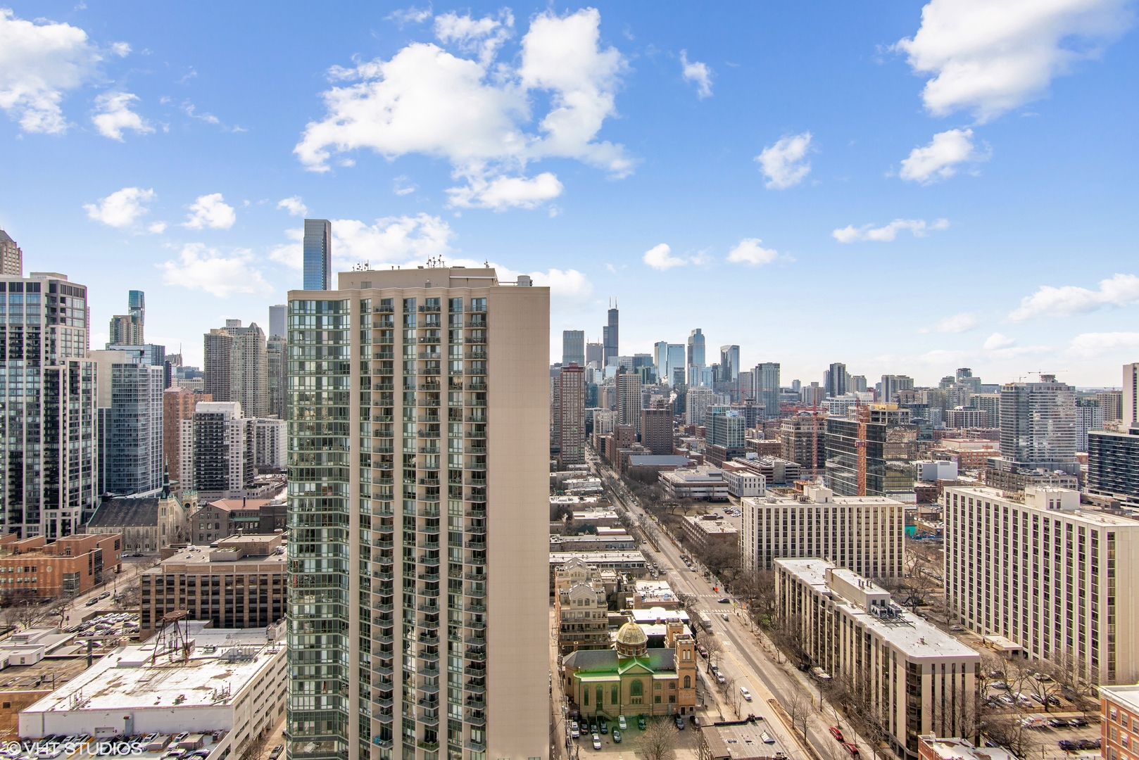 1122 North Clark Street, Unit 3401 Chicago, IL 60610 - Photo 20 of 26 a view of a city with tall buildings