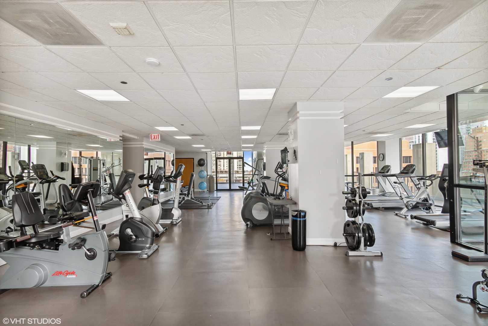 1122 North Clark Street, Unit 3401 Chicago, IL 60610 - Photo 23 of 26 a view of a room with gym equipment