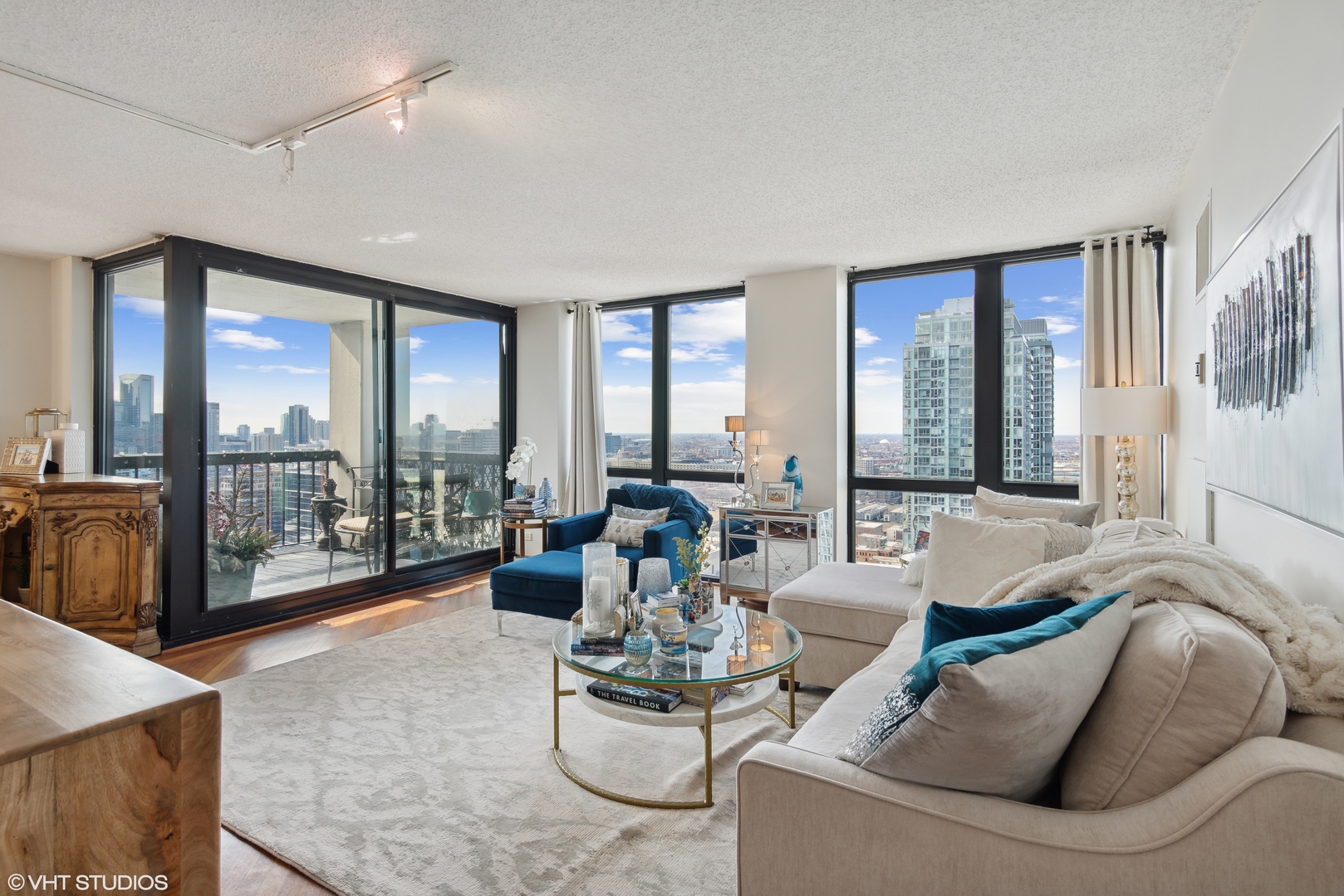 1122 North Clark Street, Unit 3401 Chicago, IL 60610 - Photo 3 of 26 a living room with furniture and a large window