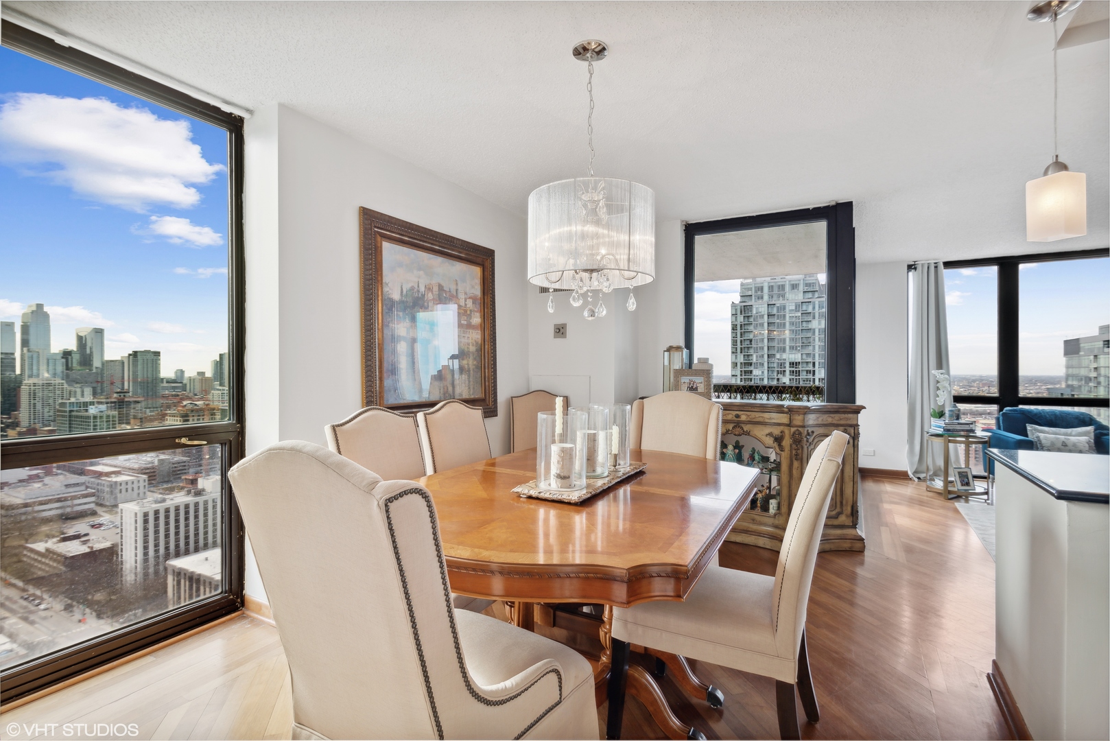 1122 North Clark Street, Unit 3401 Chicago, IL 60610 - Photo 8 of 26 a view of a dining room with furniture window and outside view