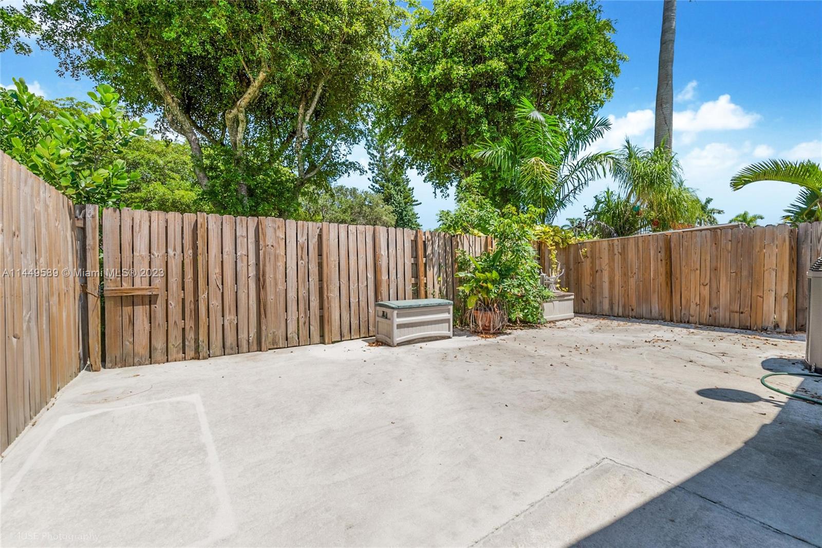 9208 Southwest 132nd Street Miami, FL 33176 - Photo 5 of 15 a view of wooden fence