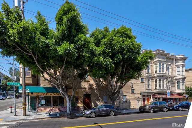 a view of a city street from a building