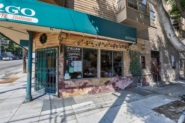 a view of a brick building with a outdoor space