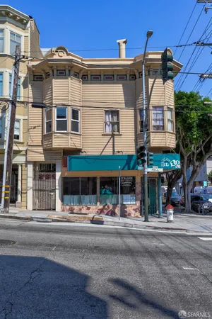 a front view of a building with street