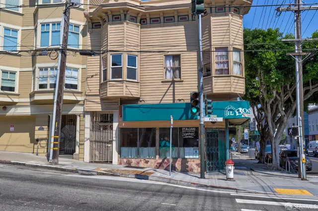 a front view of a building with street view