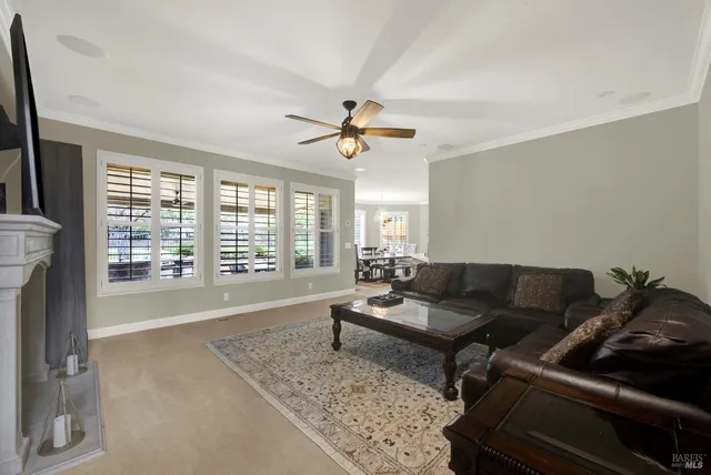a kitchen with granite countertop wooden cabinets and stainless steel appliances