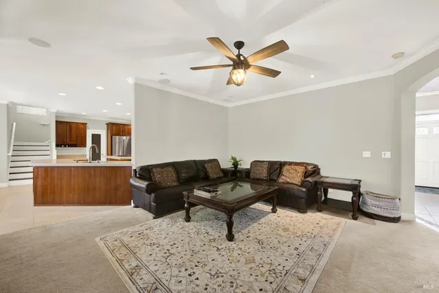 a kitchen with a stove a sink and a refrigerator