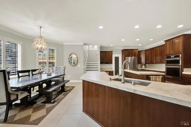a spacious bathroom with a vanity and a mirror