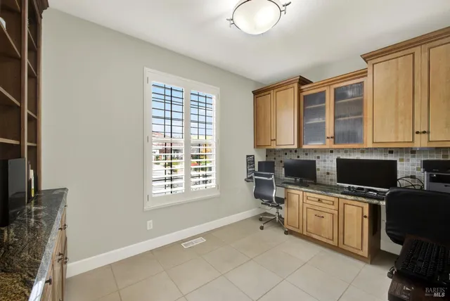 a view of a house with a yard porch and sitting area