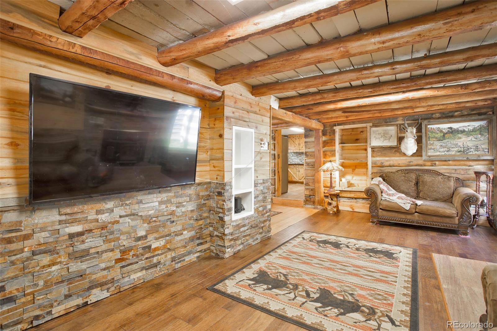 9399 Granzella Road Morrison, CO 80465 - Photo 10 of 41 a living room with furniture